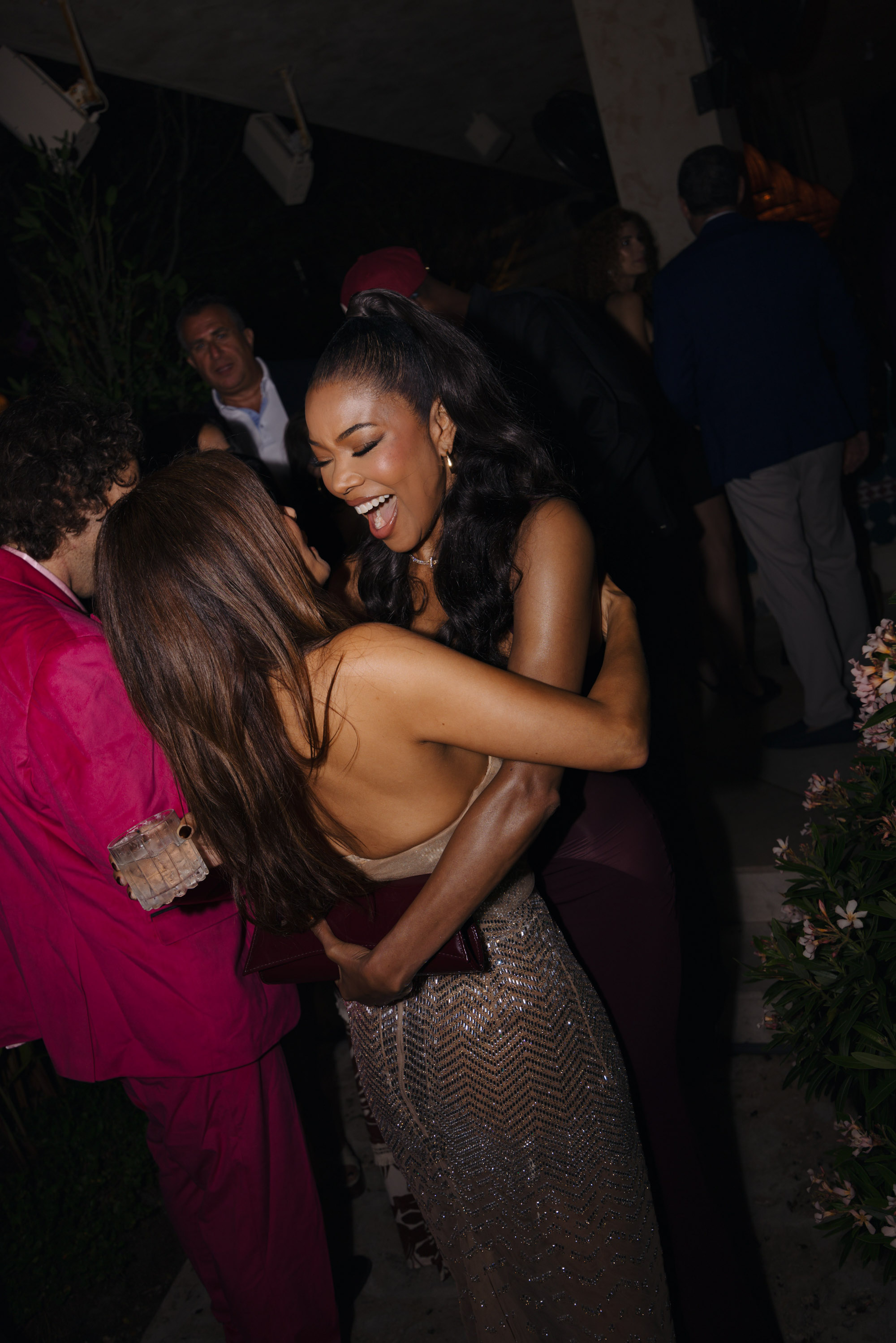 Eva Longoria and Gabrielle Union hugging.