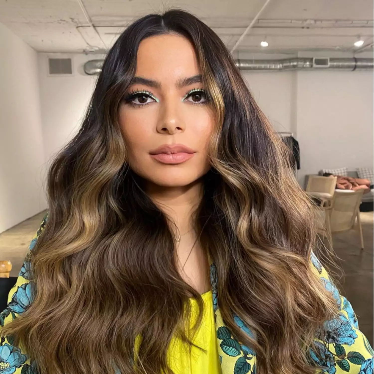 Miranda Cosgrove wearing brown hair with caramel colored balayage