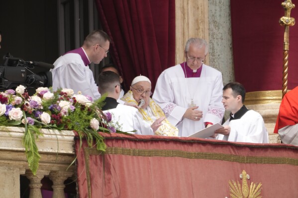 Pope Francis tours the crowd at the end of the Easter mass in St. Peter's Square at the Vatican Sunday, April 20, 2025. Francis died Monday, April 21, 2025. (AP Photo/Gregorio Borgia)