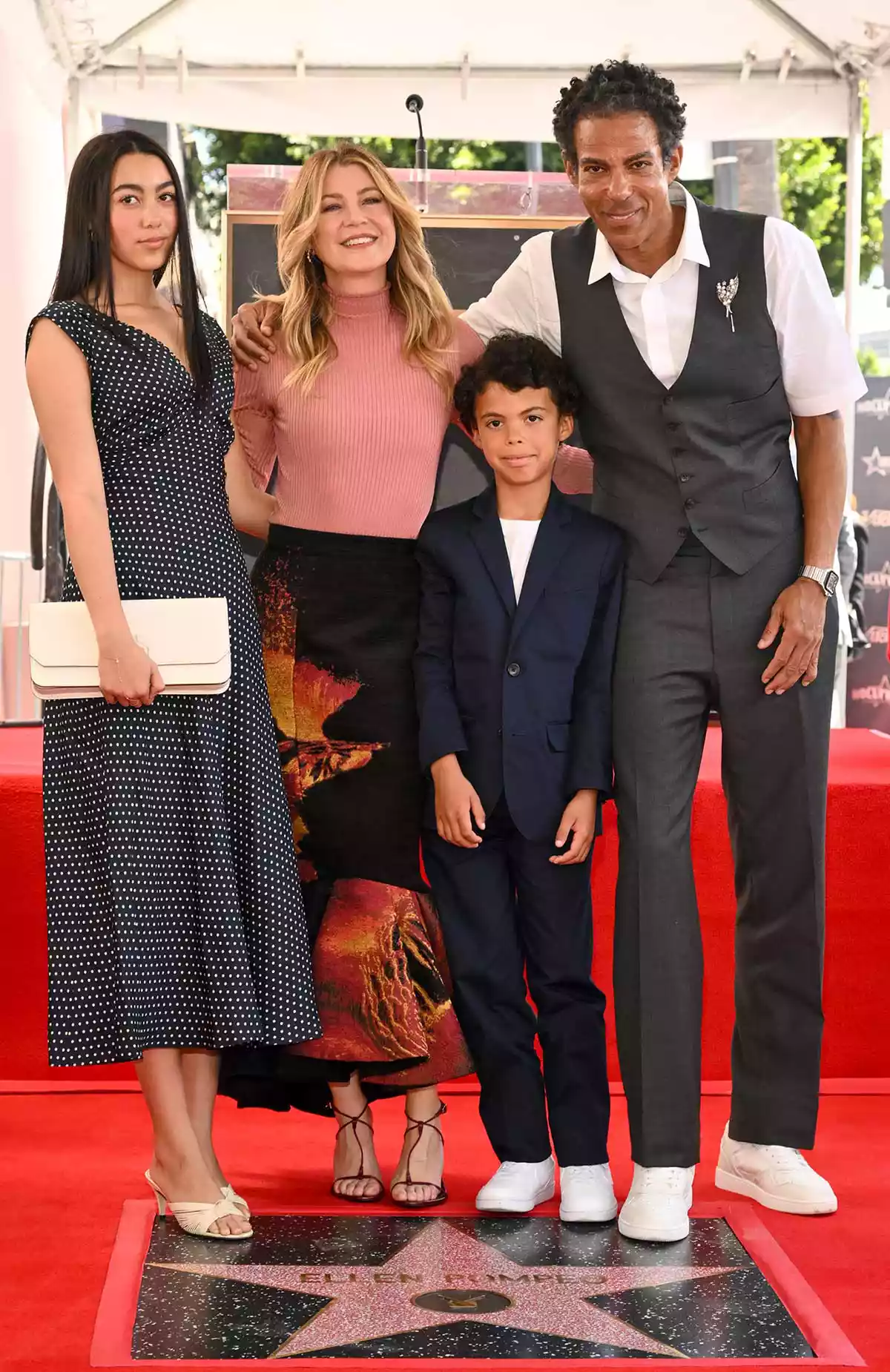Stella Luna Ivery, Ellen Pompeo, Eli Ivery, Chris Ivery at the ceremony honoring Ellen Pompeo with a star on the Hollywood Walk of Fame on April 29, 2025 in Hollywood, California.